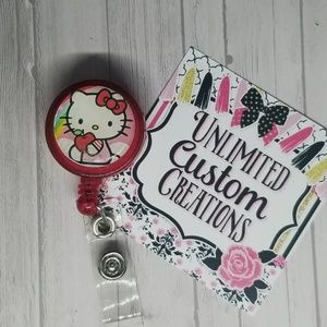 Kitty badge Reel